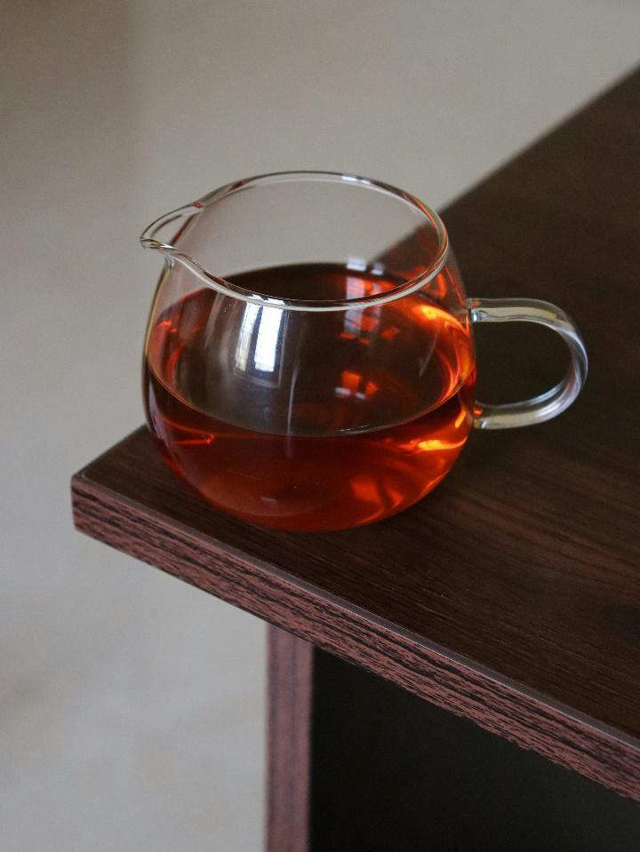 Glass pitcher filled with caffeine-free fruit tea blend.