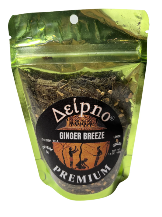Ginger Breeze herbal tea with lemon and ginger pieces in a cup.