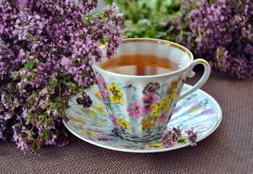Herbal tea served in a traditional printed cup.